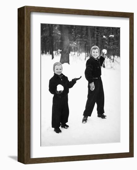 Two Brothers Play in the Snow, Ca. 1950-null-Framed Photographic Print