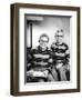 Two Brothers Pose with a Book on their Living Room Couch, Ca. 1953-null-Framed Photographic Print