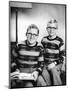 Two Brothers Pose with a Book on their Living Room Couch, Ca. 1953-null-Mounted Photographic Print