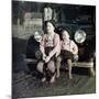 Two Brothers Sit on the Bumper of the Family Mercedes Benz in Germany, Ca. 1949-null-Mounted Photographic Print