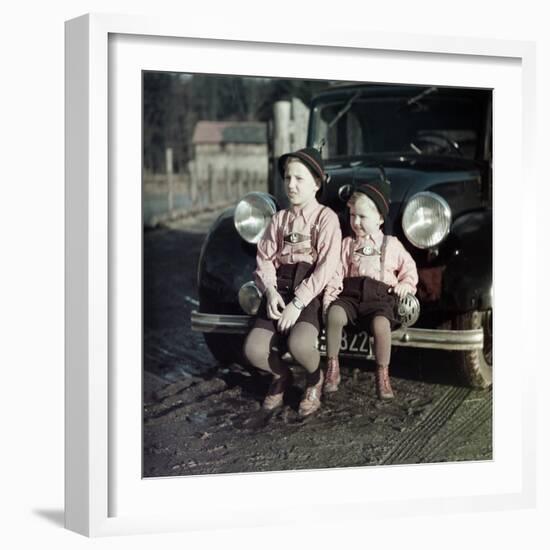 Two Brothers Sit on the Bumper of the Family Mercedes Benz in Germany, Ca. 1949-null-Framed Photographic Print