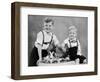 Two Brothers Sit with Easter Decorations, Ca. 1948-null-Framed Photographic Print