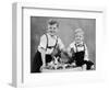 Two Brothers Sit with Easter Decorations, Ca. 1948-null-Framed Photographic Print