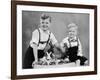 Two Brothers Sit with Easter Decorations, Ca. 1948-null-Framed Photographic Print