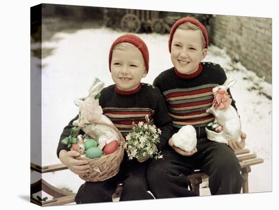 Two Brothers Sit with Easter Decorations Outside in Germany, Ca. 1948-null-Stretched Canvas