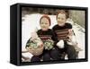 Two Brothers Sit with Easter Decorations Outside in Germany, Ca. 1948-null-Framed Stretched Canvas