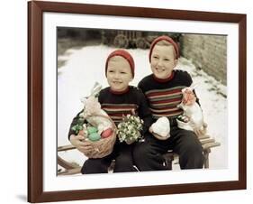 Two Brothers Sit with Easter Decorations Outside in Germany, Ca. 1948-null-Framed Photographic Print