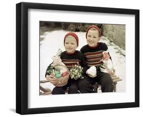 Two Brothers Sit with Easter Decorations Outside in Germany, Ca. 1948-null-Framed Photographic Print