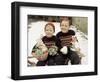 Two Brothers Sit with Easter Decorations Outside in Germany, Ca. 1948-null-Framed Photographic Print