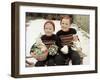 Two Brothers Sit with Easter Decorations Outside in Germany, Ca. 1948-null-Framed Photographic Print