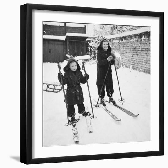 Two Brothers Stand on their Skis in the Snow, Ca. 1950-null-Framed Premium Photographic Print