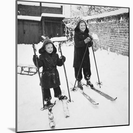 Two Brothers Stand on their Skis in the Snow, Ca. 1950-null-Mounted Photographic Print