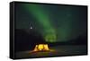 Two Campers Drinking a Bottle of Wine in a Tent under the Northern Lights-Jami Tarris-Framed Stretched Canvas