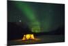 Two Campers Drinking a Bottle of Wine in a Tent under the Northern Lights-Jami Tarris-Mounted Photographic Print