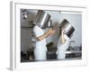 Two Chefs Having Discussion with Large Pans on their Heads-Robert Kneschke-Framed Photographic Print