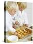 Two Children Brushing Biscuits with Glace Icing-Renate Forster-Stretched Canvas