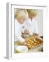 Two Children Brushing Biscuits with Glace Icing-Renate Forster-Framed Photographic Print