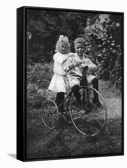 Two Children on a Tricycle, 1911-1912-CW Perry-Framed Stretched Canvas