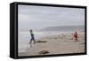 Two Children Playing on a Beach-Clive Nolan-Framed Stretched Canvas