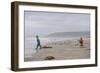 Two Children Playing on a Beach-Clive Nolan-Framed Photographic Print