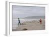 Two Children Playing on a Beach-Clive Nolan-Framed Photographic Print