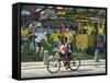 Two Children Ride Their Bicycle Pass a Mural-null-Framed Stretched Canvas
