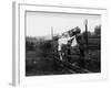 Two Children Stand on a Fence and Wave a Handkerchief at a Passing Steam Train-Staniland Pugh-Framed Photographic Print