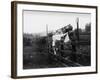 Two Children Stand on a Fence and Wave a Handkerchief at a Passing Steam Train-Staniland Pugh-Framed Photographic Print