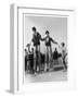 Two Clowns on Stilts Assisted by Girls in Bathing Costumes at Ramsgate Kent England-null-Framed Art Print