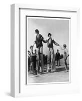 Two Clowns on Stilts Assisted by Girls in Bathing Costumes at Ramsgate Kent England-null-Framed Art Print