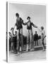 Two Clowns on Stilts Assisted by Girls in Bathing Costumes at Ramsgate Kent England-null-Stretched Canvas