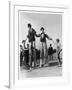 Two Clowns on Stilts Assisted by Girls in Bathing Costumes at Ramsgate Kent England-null-Framed Art Print