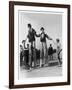 Two Clowns on Stilts Assisted by Girls in Bathing Costumes at Ramsgate Kent England-null-Framed Art Print