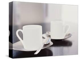 Two coffee cups on a table-null-Stretched Canvas