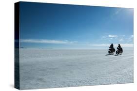 Two Cyclists Cycle in the Morning over the Salar De Uyuni-Alex Saberi-Stretched Canvas