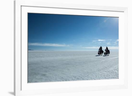 Two Cyclists Cycle in the Morning over the Salar De Uyuni-Alex Saberi-Framed Photographic Print