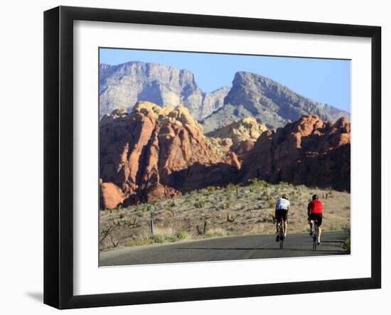 Two Cyclists Ride Along the 13-Mile-Long Scenic Drive-null-Framed Photographic Print