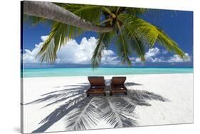 Two deck chairs under palm trees and tropical beach, The Maldives, Indian Ocean, Asia-Sakis Papadopoulos-Stretched Canvas