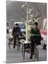 Two Delivery Riders Carry a Dentists Drill and Chair Along a Beijing Street January 4-null-Mounted Photographic Print