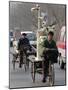 Two Delivery Riders Carry a Dentists Drill and Chair Along a Beijing Street January 4-null-Mounted Photographic Print