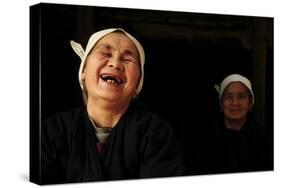 Two Dong Women, One Laughing, in a Dark Room, Sanjiang Dong Village, Guangxi, China-Enrique Lopez-Tapia-Stretched Canvas