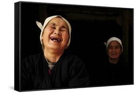 Two Dong Women, One Laughing, in a Dark Room, Sanjiang Dong Village, Guangxi, China-Enrique Lopez-Tapia-Framed Stretched Canvas