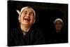 Two Dong Women, One Laughing, in a Dark Room, Sanjiang Dong Village, Guangxi, China-Enrique Lopez-Tapia-Stretched Canvas