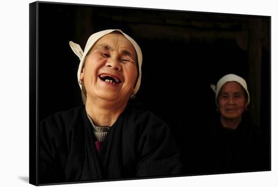 Two Dong Women, One Laughing, in a Dark Room, Sanjiang Dong Village, Guangxi, China-Enrique Lopez-Tapia-Framed Stretched Canvas