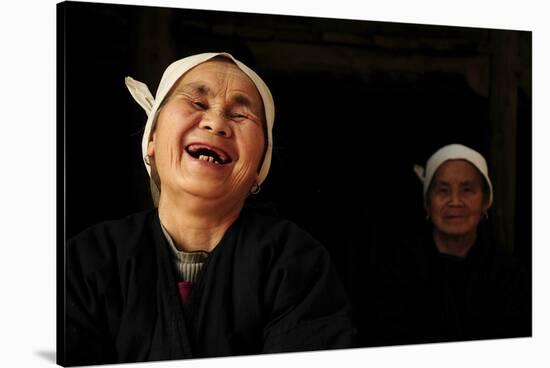 Two Dong Women, One Laughing, in a Dark Room, Sanjiang Dong Village, Guangxi, China-Enrique Lopez-Tapia-Stretched Canvas