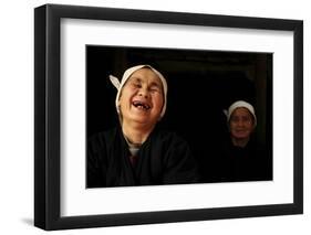 Two Dong Women, One Laughing, in a Dark Room, Sanjiang Dong Village, Guangxi, China-Enrique Lopez-Tapia-Framed Photographic Print