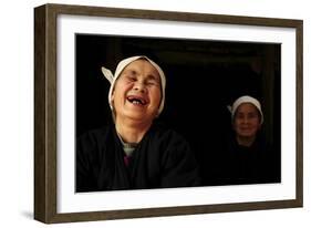 Two Dong Women, One Laughing, in a Dark Room, Sanjiang Dong Village, Guangxi, China-Enrique Lopez-Tapia-Framed Photographic Print