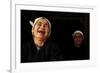 Two Dong Women, One Laughing, in a Dark Room, Sanjiang Dong Village, Guangxi, China-Enrique Lopez-Tapia-Framed Photographic Print