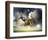 Two Football Players in Jump to Strike the Ball at the Stadium-Sergey Nivens-Framed Photographic Print