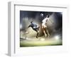 Two Football Players in Jump to Strike the Ball at the Stadium-Sergey Nivens-Framed Photographic Print